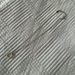 Elegant Silver Necklace with Circular Pendant